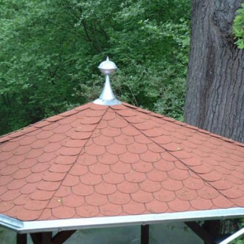 Turmspitze aus Zink auf Schindeln